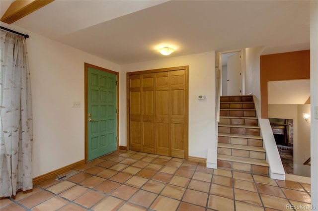 3722 Monterey Pl, Boulder, CO 80301 - foyer entrance featuring stairs and light tile patterned flooring