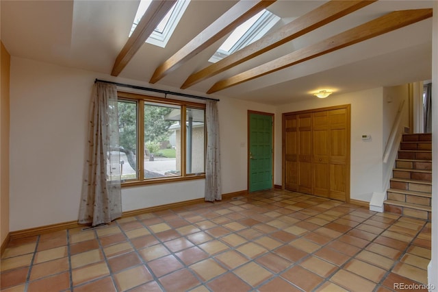 3722 Monterey Pl, Boulder, CO 80301 - foyer entrance featuring a skylight, stairway, and light tile patterned floors