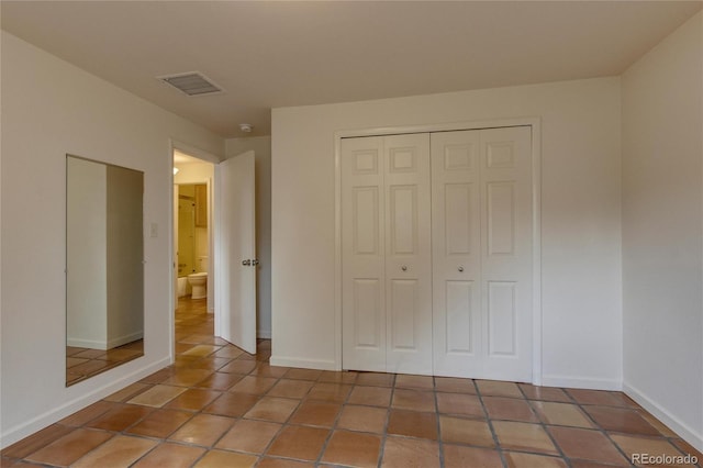 3722 Monterey Pl, Boulder, CO 80301 - unfurnished bedroom featuring a closet and tile patterned flooring