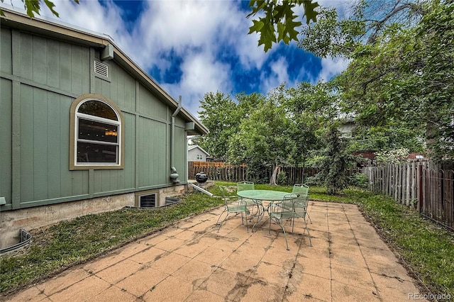 3722 Monterey Pl, Boulder, CO 80301 - fenced backyard with a patio area and outdoor dining space