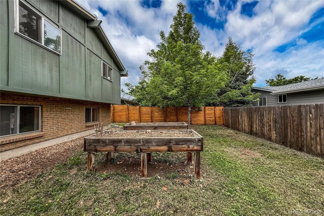 3722 Monterey Pl, Boulder, CO 80301 - fenced backyard with a vegetable garden