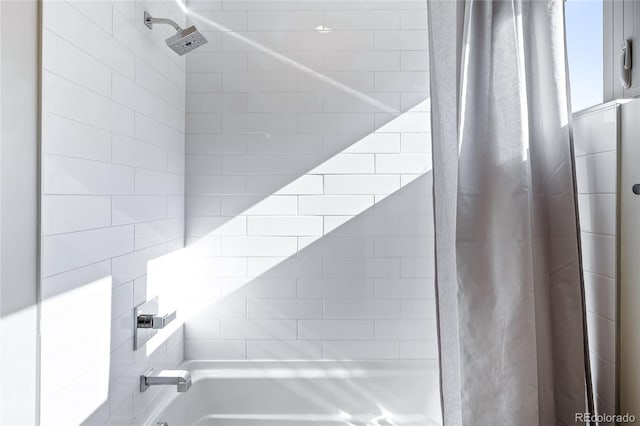 bathroom featuring shower / bath combination with curtain