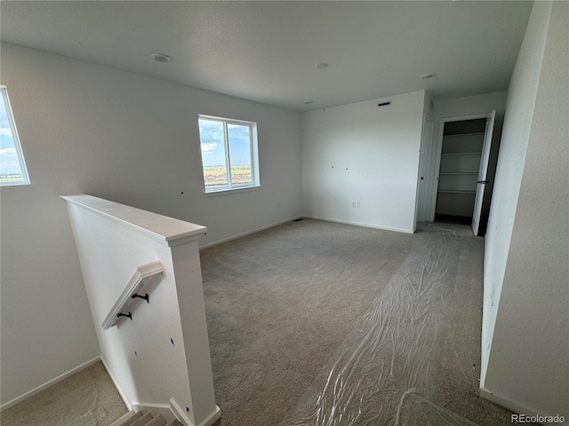 2142 S Irvington St, Aurora, CO 80018 - carpeted spare room featuring baseboards