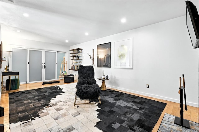 960 N Pennsylvania St Unit 6, Denver, CO 80203 - sitting room with recessed lighting, wood finished floors, and french doors
