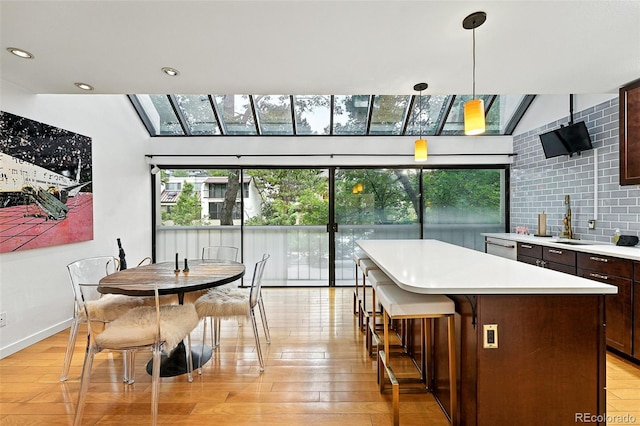 960 N Pennsylvania St Unit 6, Denver, CO 80203 - dining area with plenty of natural light, a skylight, and light wood-type flooring