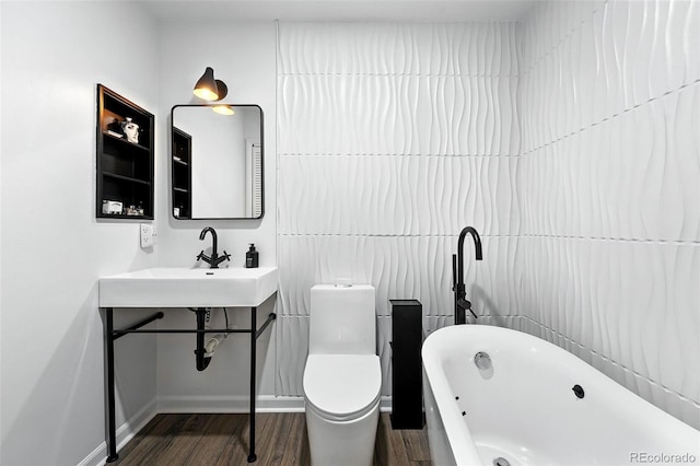 960 N Pennsylvania St Unit 6, Denver, CO 80203 - full bathroom with a soaking tub and wood finished floors