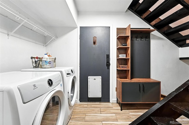 960 N Pennsylvania St Unit 6, Denver, CO 80203 - laundry room with washing machine and clothes dryer and light wood finished floors