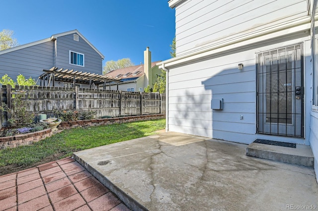 view of patio / terrace with fence