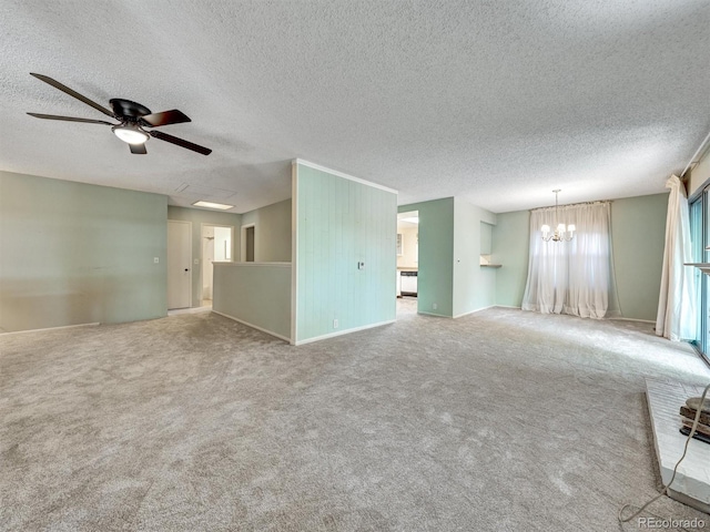 8730 E Roundtree Ave, Greenwood Village, CO 80111 - spare room featuring ceiling fan, a chandelier, carpet, and a textured ceiling