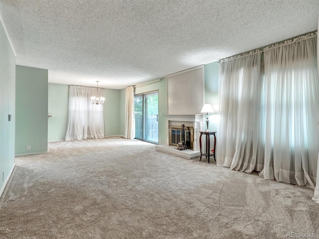 8730 E Roundtree Ave, Greenwood Village, CO 80111 - unfurnished living room featuring a chandelier, a textured ceiling, a fireplace, and carpet flooring