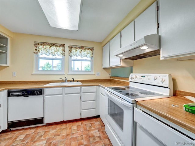 8730 E Roundtree Ave, Greenwood Village, CO 80111 - kitchen featuring white appliances, under cabinet range hood, a sink, light countertops, and white cabinets