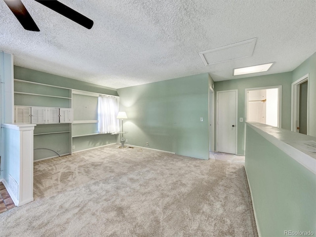 8730 E Roundtree Ave, Greenwood Village, CO 80111 - carpeted empty room with a ceiling fan and a textured ceiling