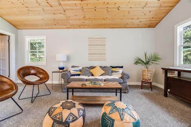 carpeted living area featuring lofted ceiling, wood ceiling, and baseboards