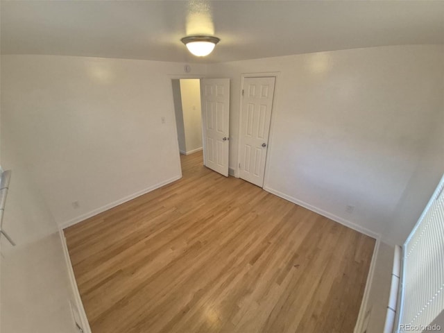 588 Empire St, Aurora, CO 80010 - unfurnished room with light wood finished floors and baseboards