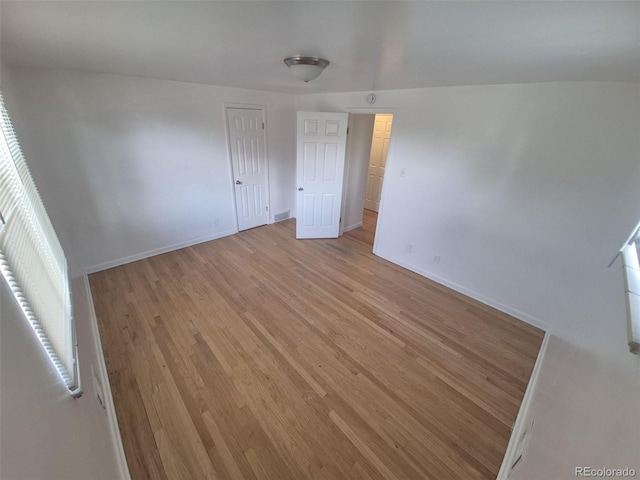 588 Empire St, Aurora, CO 80010 - empty room with baseboards and light wood-style floors