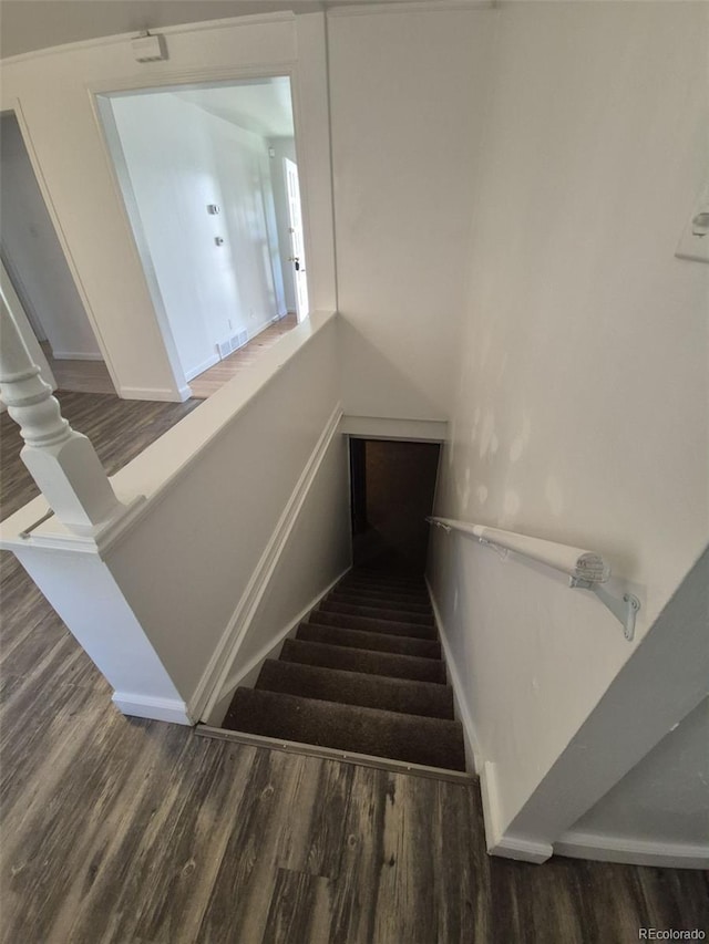 588 Empire St, Aurora, CO 80010 - stairway featuring wood finished floors and baseboards