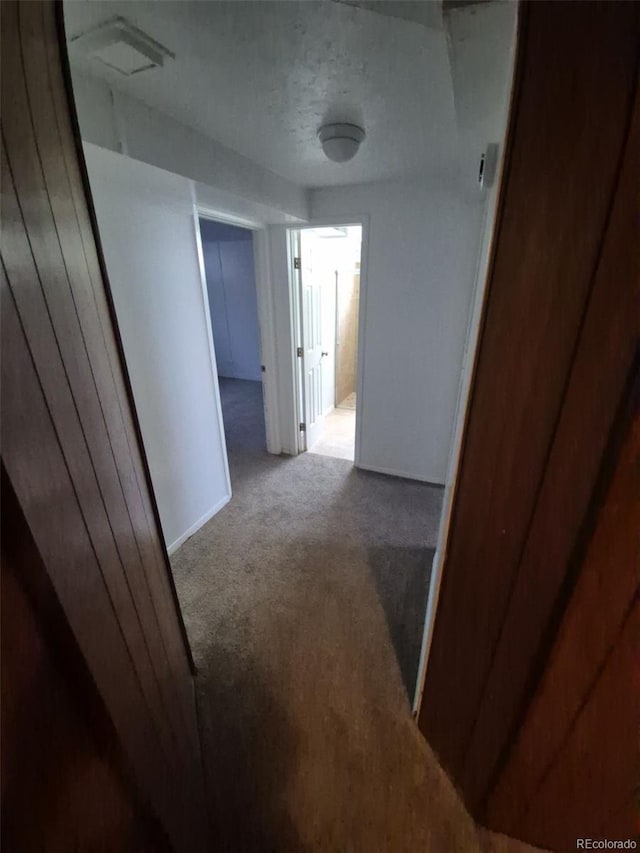 588 Empire St, Aurora, CO 80010 - corridor featuring carpet and baseboards