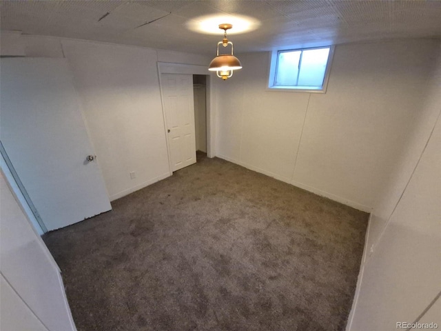588 Empire St, Aurora, CO 80010 - below grade area featuring carpet and baseboards