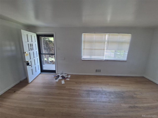 588 Empire St, Aurora, CO 80010 - entryway with wood finished floors and baseboards