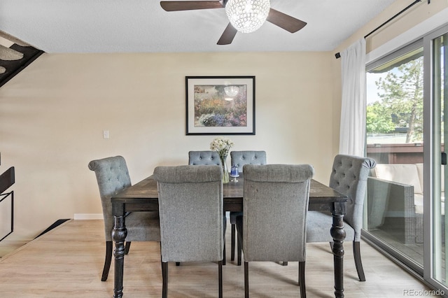 6856 S Broadway, Centennial, CO 80122 - dining room with a ceiling fan and light wood-type flooring