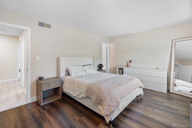 6856 S Broadway, Centennial, CO 80122 - bedroom featuring wood finished floors and baseboards