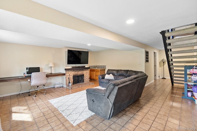 6856 S Broadway, Centennial, CO 80122 - living room featuring light tile patterned flooring, a fireplace with raised hearth, a desk, baseboards, and recessed lighting