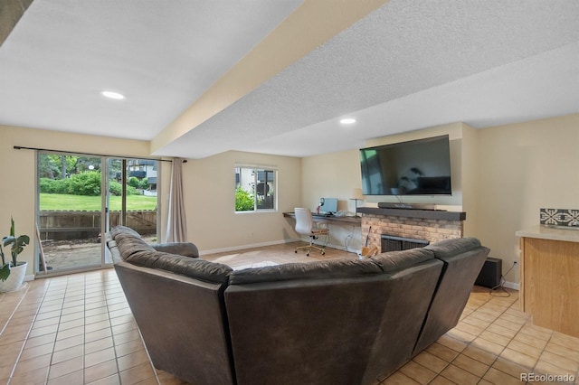 6856 S Broadway, Centennial, CO 80122 - living room with light tile patterned flooring, plenty of natural light, baseboards, and recessed lighting