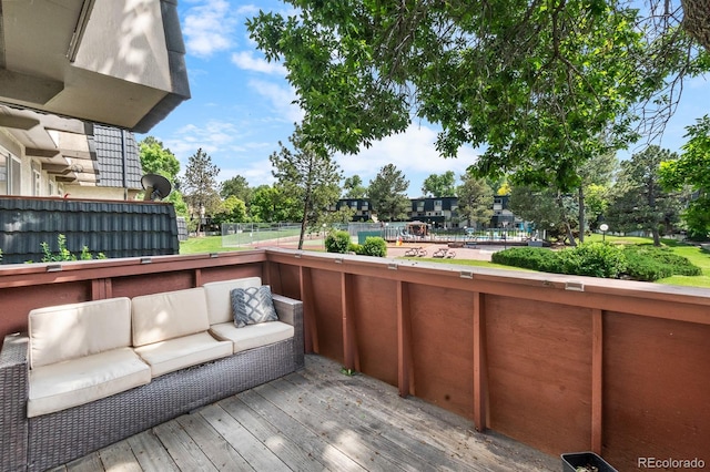 6856 S Broadway, Centennial, CO 80122 - wooden terrace with an outdoor living space