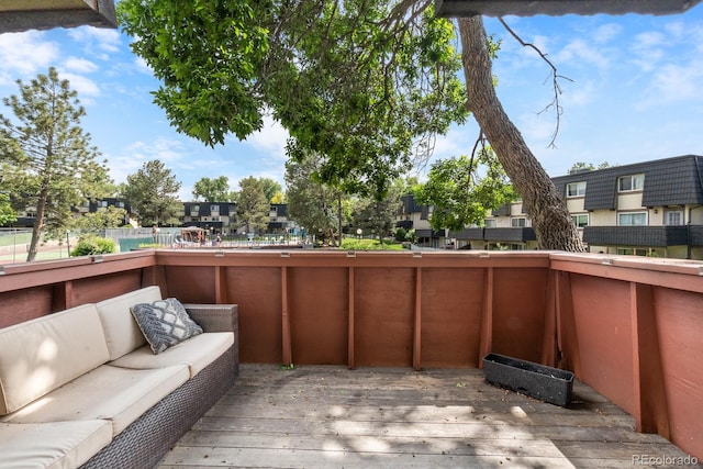 6856 S Broadway, Centennial, CO 80122 - wooden terrace featuring outdoor lounge area