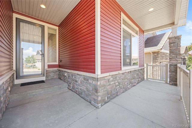 property entrance with a porch