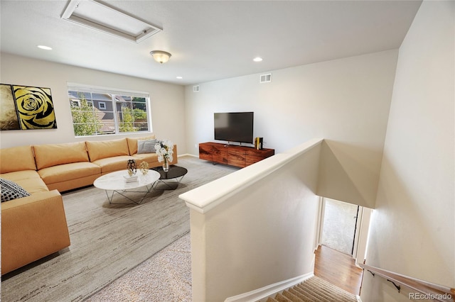 living room with light hardwood / wood-style flooring