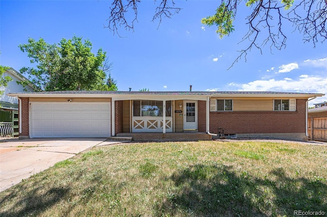 12058 E Virginia Pl, Aurora, CO 80012 - ranch-style house with driveway, brick siding, and a garage