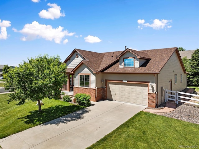 4143 Eagle Ridge Way, Castle Rock, CO 80104 - view of front of house featuring brick siding, driveway, an attached garage, and roof with shingles