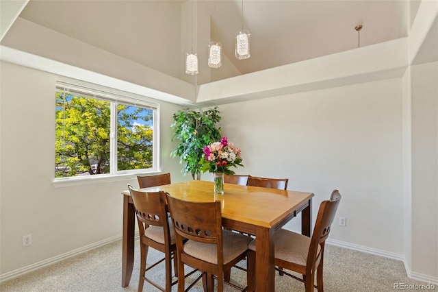 4143 Eagle Ridge Way, Castle Rock, CO 80104 - dining room with light carpet and a towering ceiling