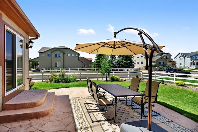4143 Eagle Ridge Way, Castle Rock, CO 80104 - view of patio with a residential view and outdoor dining area