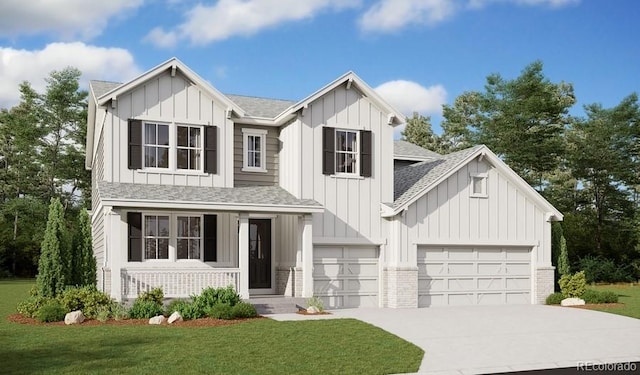 modern farmhouse featuring covered porch and a front yard