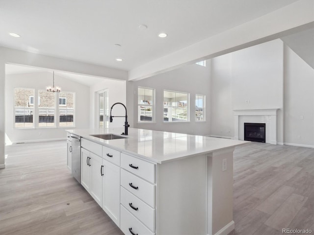4741 Twelve Oaks Way, Castle Rock, CO 80104 - kitchen with a sink, a chandelier, light wood finished floors, stainless steel dishwasher, and recessed lighting