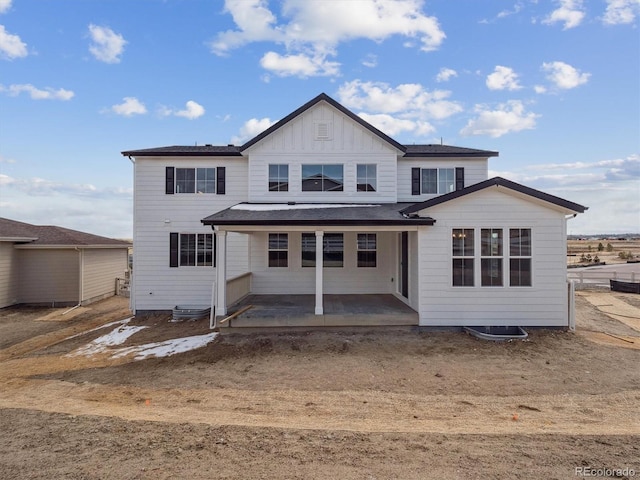 4741 Twelve Oaks Way, Castle Rock, CO 80104 - back of property featuring board and batten siding and covered porch