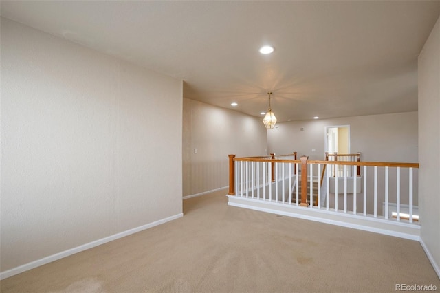 empty room with recessed lighting, baseboards, and carpet floors