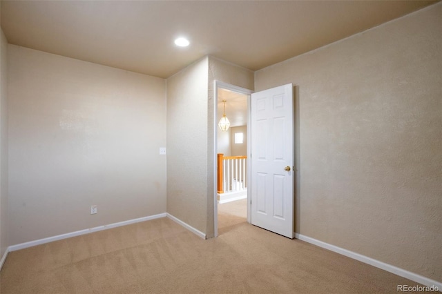 interior space with recessed lighting and baseboards