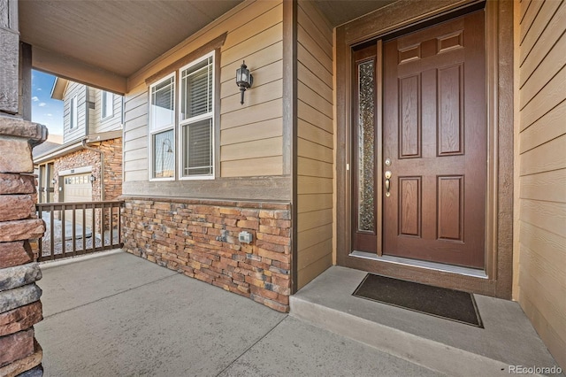 property entrance with a porch