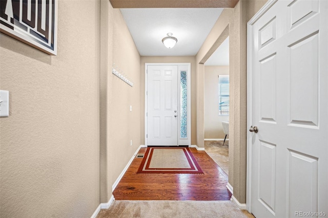 doorway featuring hardwood / wood-style floors