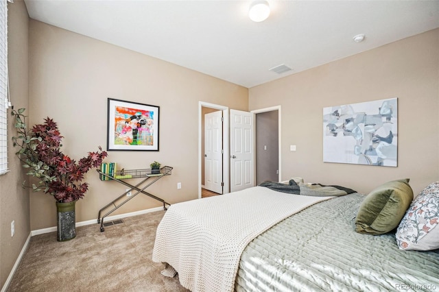 bedroom featuring carpet