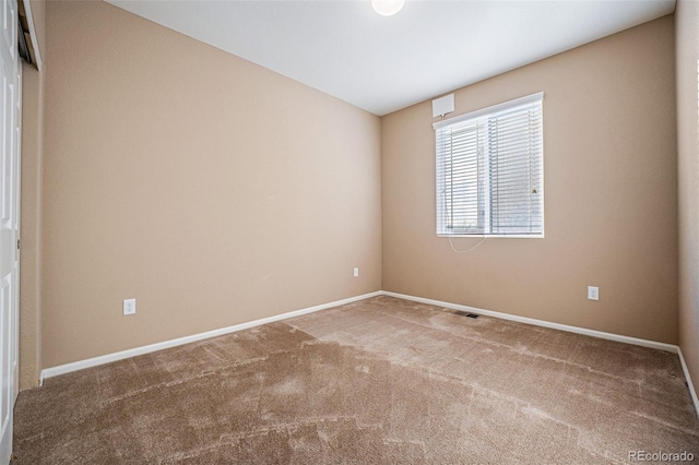 view of carpeted spare room