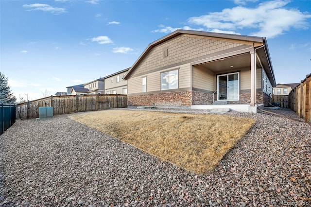 back of house featuring a patio