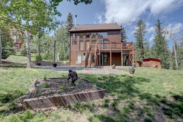 10438 Sunlight Ln, Conifer, CO 80433 - rear view of property with stairs, a wooden deck, and a lawn