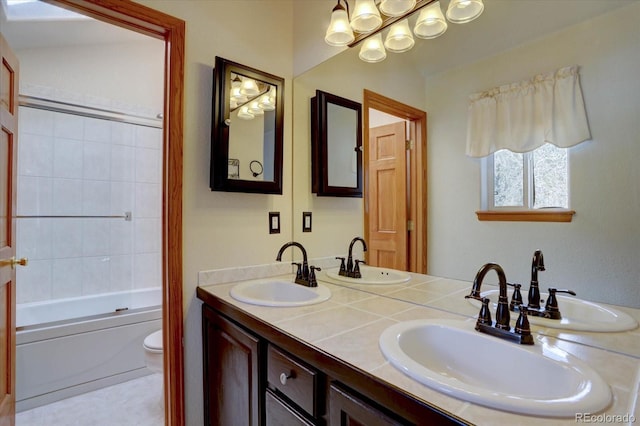 10438 Sunlight Ln, Conifer, CO 80433 - full bath featuring double vanity and combined bath / shower with glass door