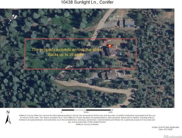 10438 Sunlight Ln, Conifer, CO 80433 - aerial overview of property's location featuring property boundaries highlighted