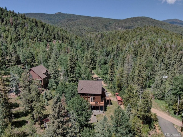 10438 Sunlight Ln, Conifer, CO 80433 - aerial view of property and surrounding area featuring a forest