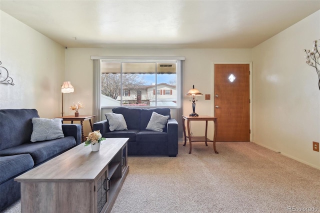 living room with light colored carpet